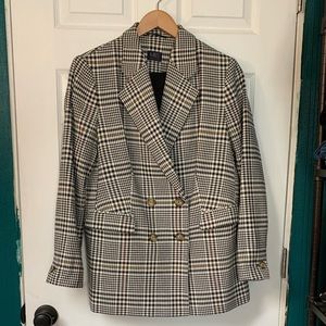 Black and white women’s double breasted blazer us size 10.
